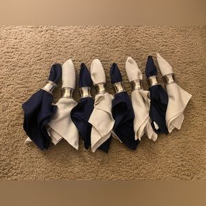 Set of 8 cream & blue cloth napkins with silver holders